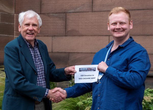 Nantwich Camera Club Chairman John Kay presentation of 60 to Dan Harriso.d.jpg1